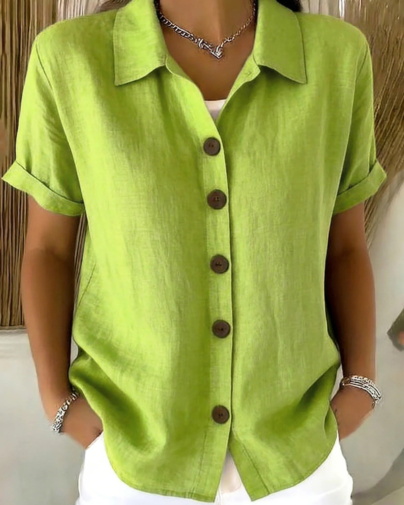 Blusa donna verde con bottoni e maniche corte