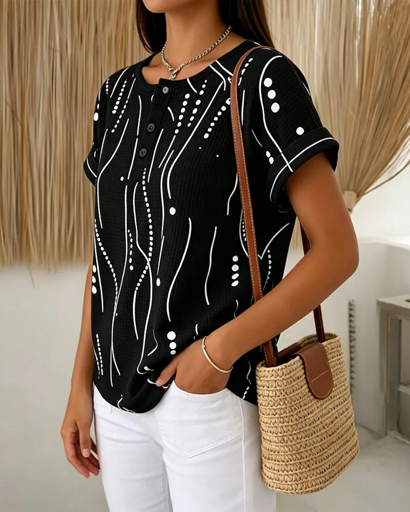 T-shirt donna rosa con bottoni e stampa grafica
