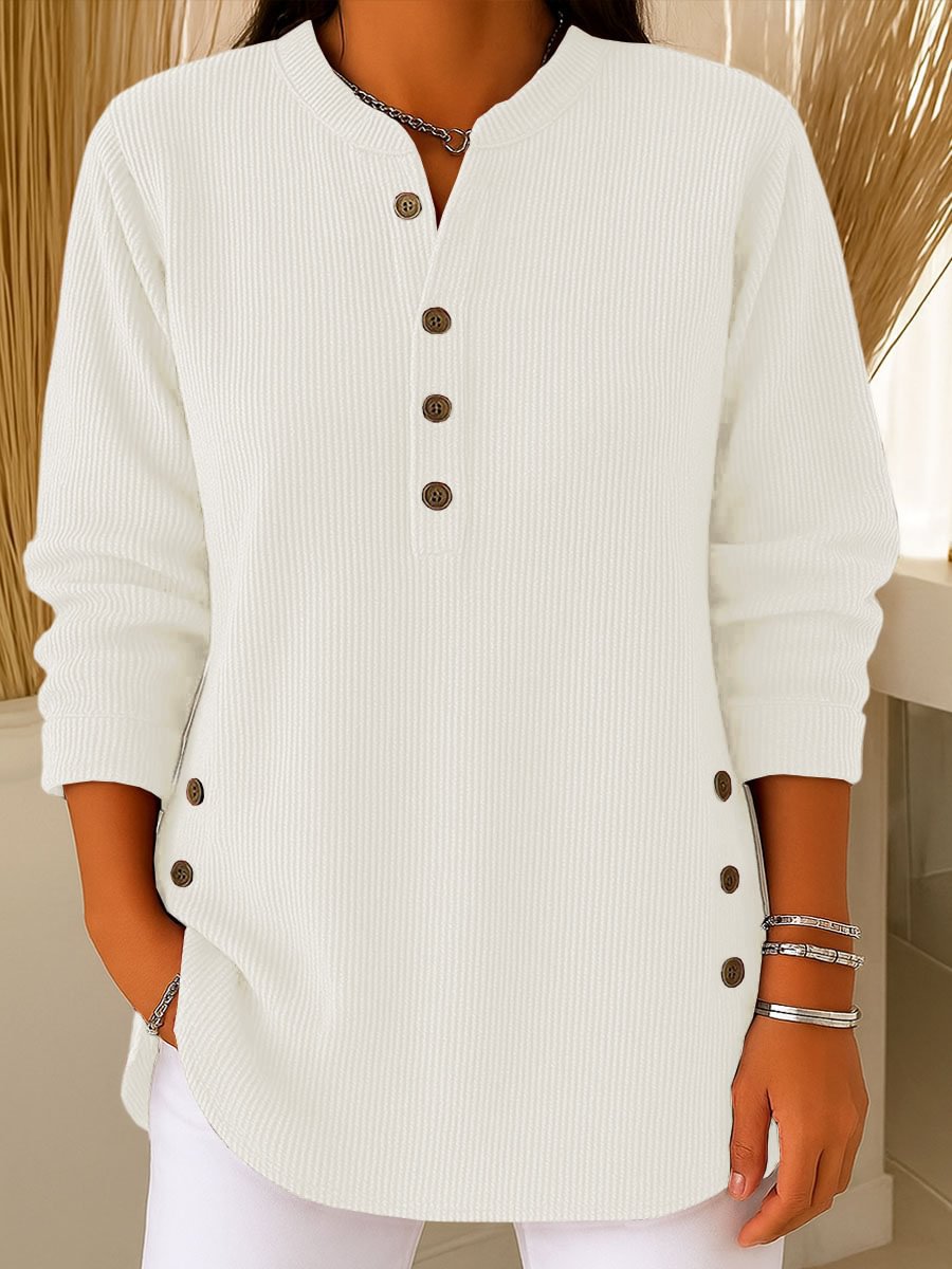 Blusa donna testurizzata con bottoni laterali e maniche lunghe