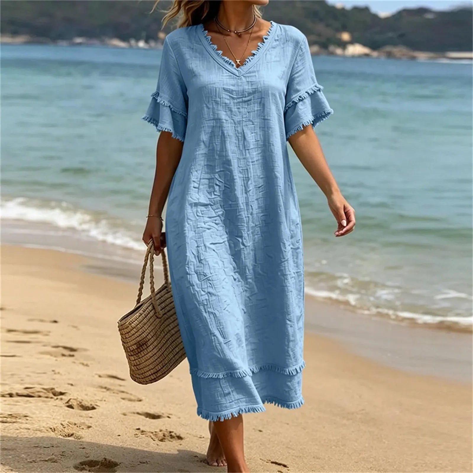 Abito donna bohémien con scollo a V e frange