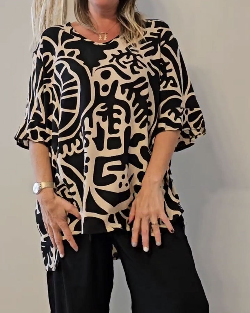 Top donna ampio con stampa astratta