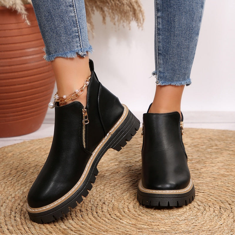 Stivaletti donna con zip laterale e suola platform