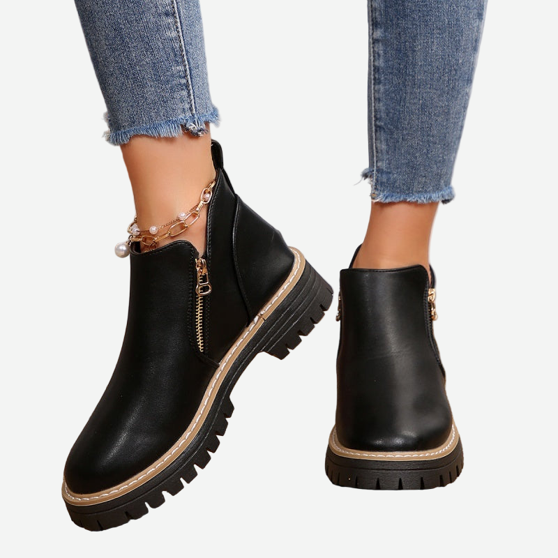 Stivaletti donna con zip laterale e suola platform