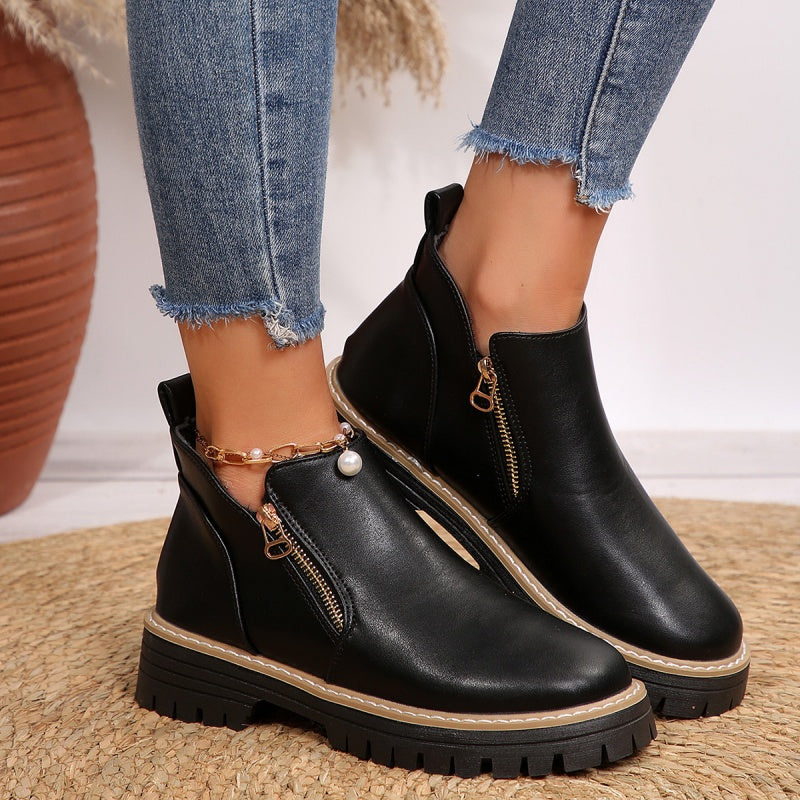 Stivaletti donna con zip laterale e suola platform