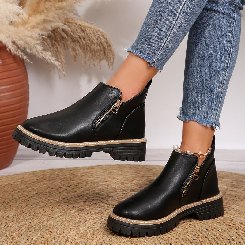 Stivaletti donna con zip laterale e suola platform