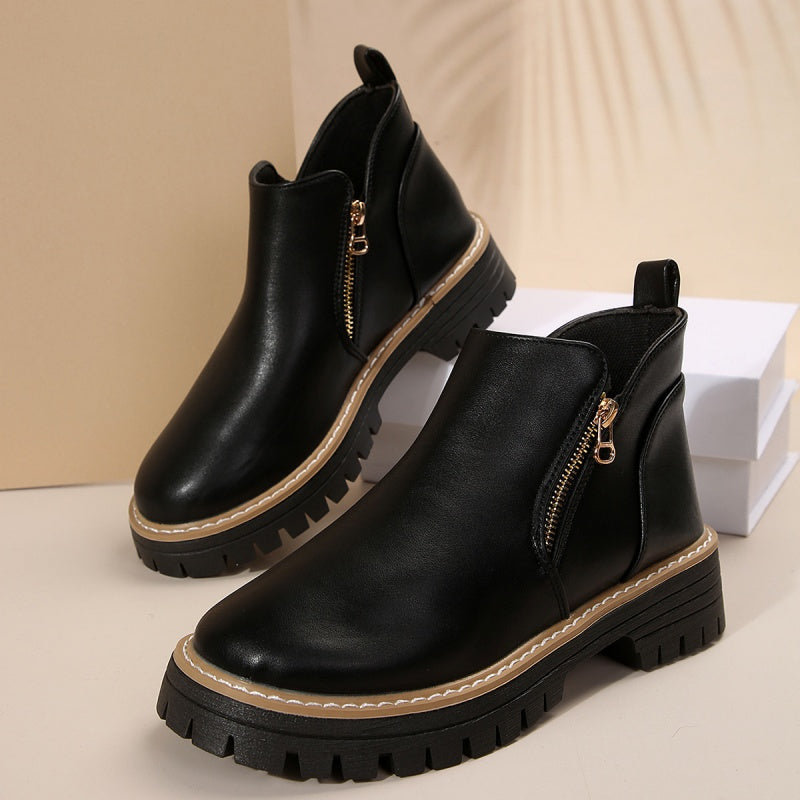 Stivaletti donna con zip laterale e suola platform