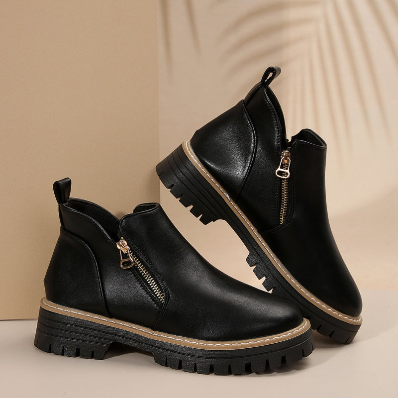 Stivaletti donna con zip laterale e suola platform