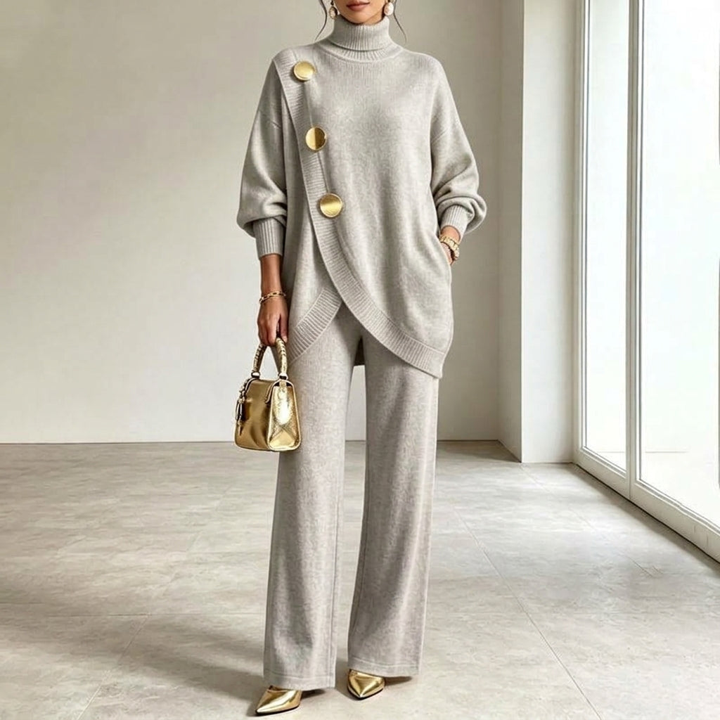 Completo donna in maglia con top asimmetrico e pantaloni palazzo