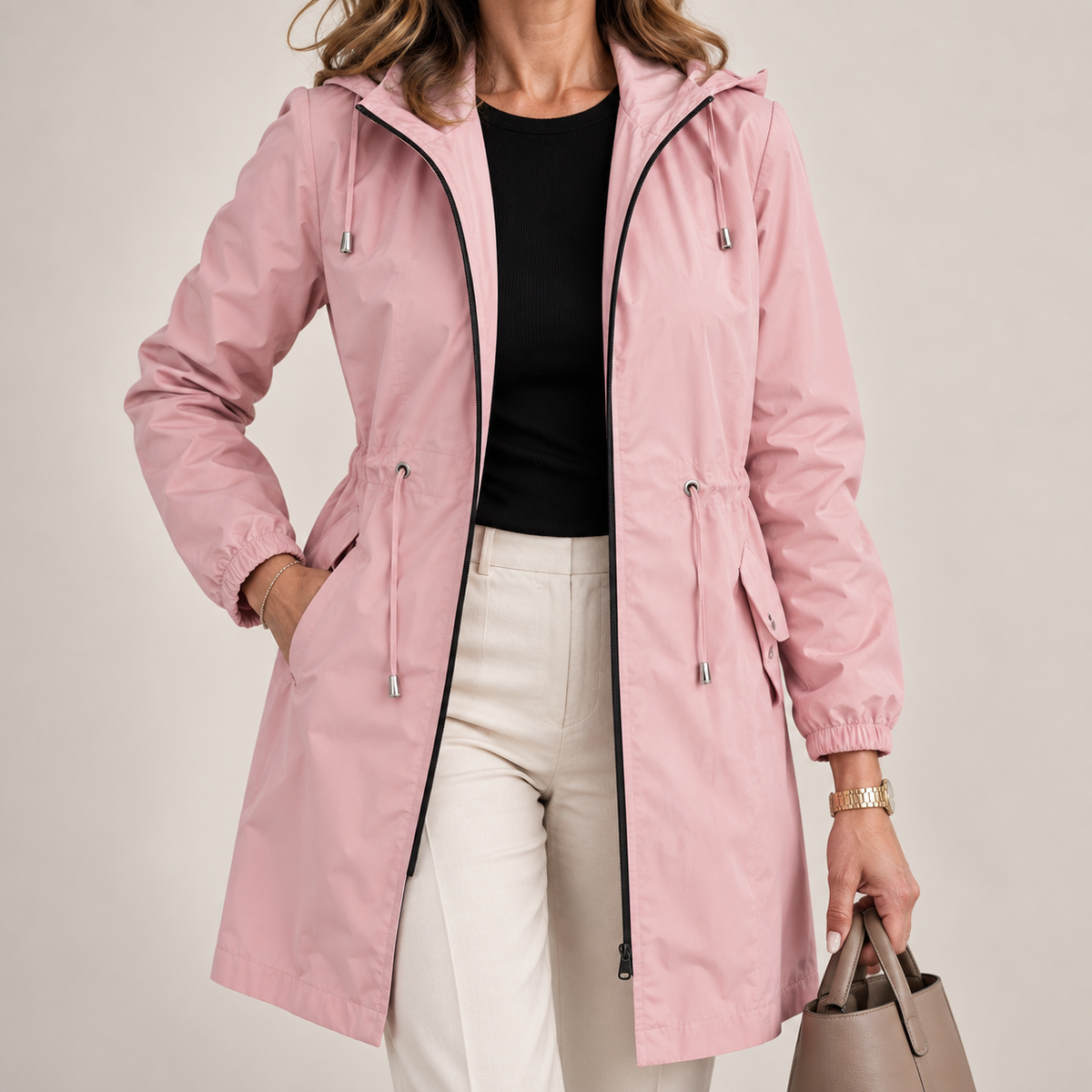 Parka donna impermeabile con cappuccio e vita regolabile