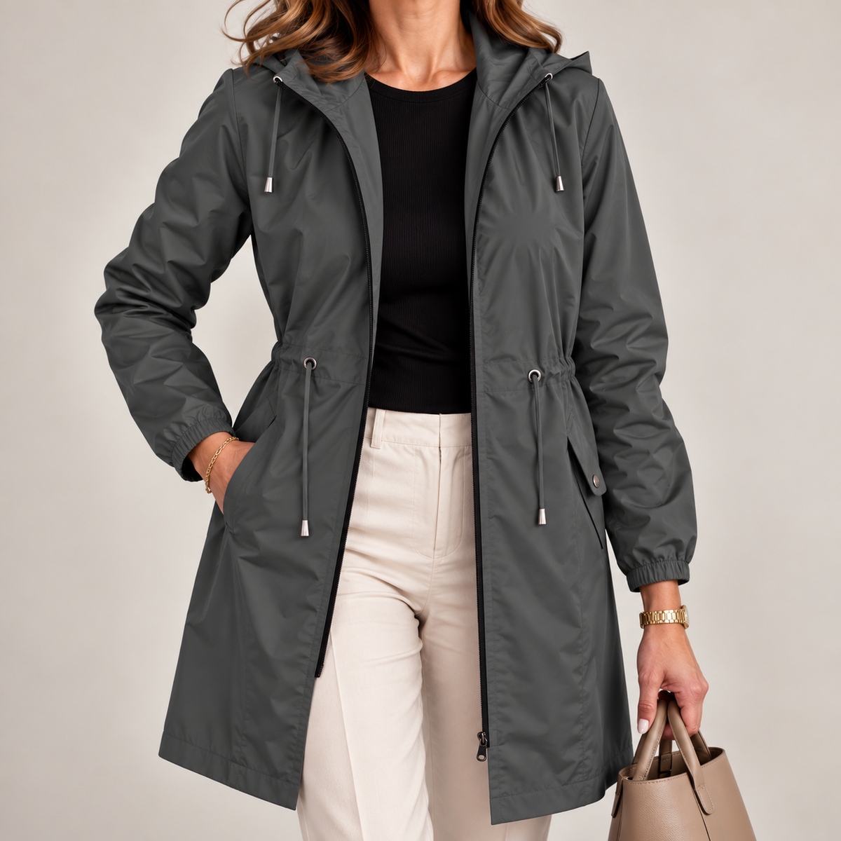 Parka donna impermeabile con cappuccio e vita regolabile