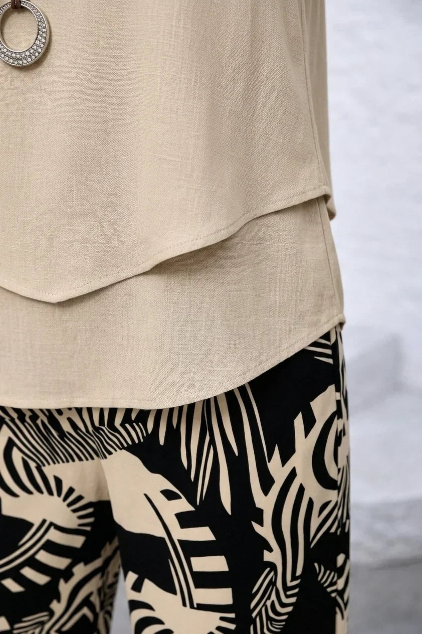 Completo donna due pezzi con top fluido e pantaloni stampati