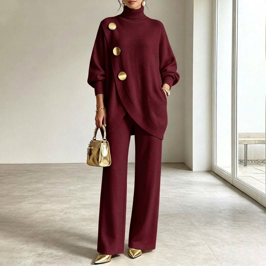 Completo donna in maglia con top asimmetrico e pantaloni palazzo