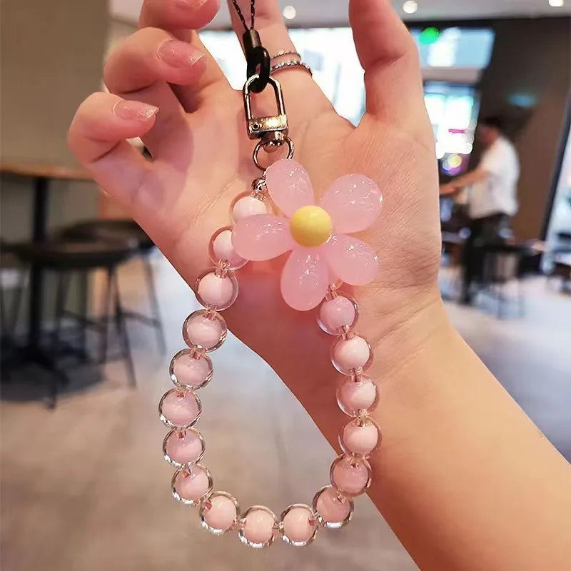 Laccetto telefono donna con perline macaron e fiore