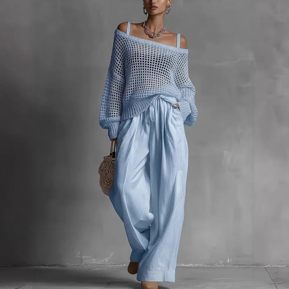 Completo donna maglione traforato pantaloni larghi