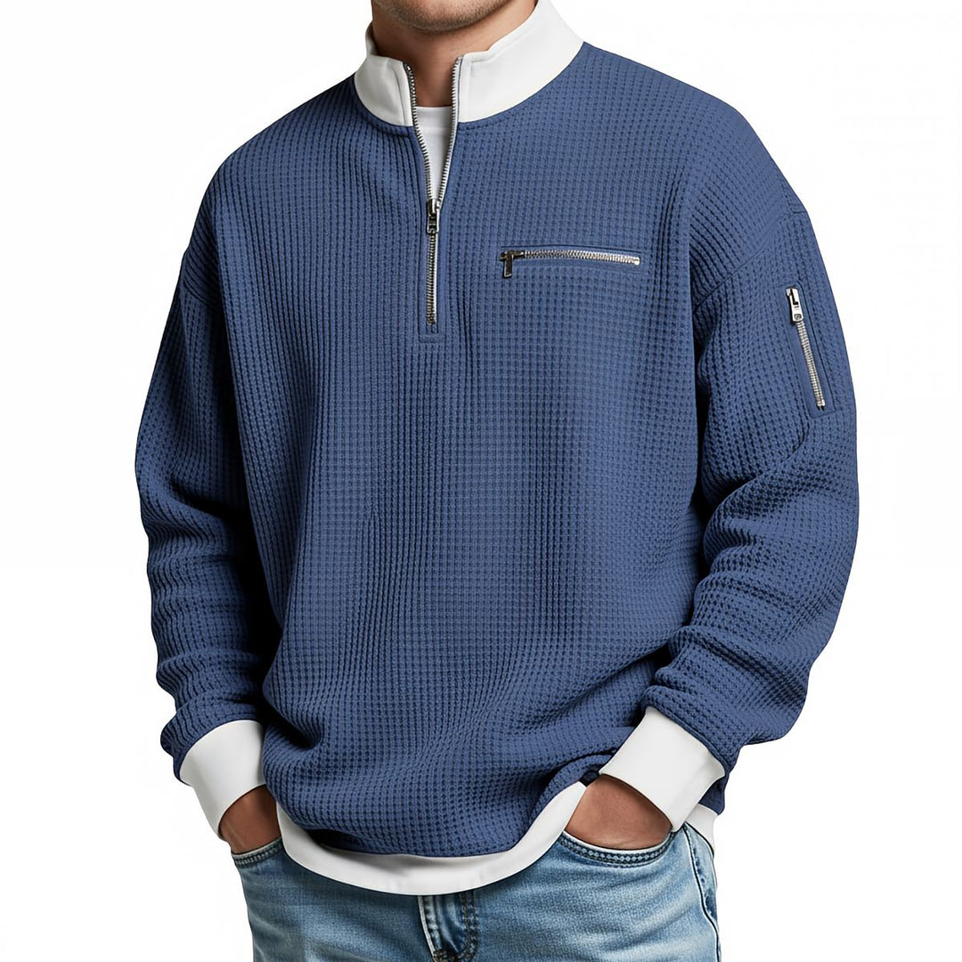 Maglione uomo waffle con mezza zip e tasche con cerniera