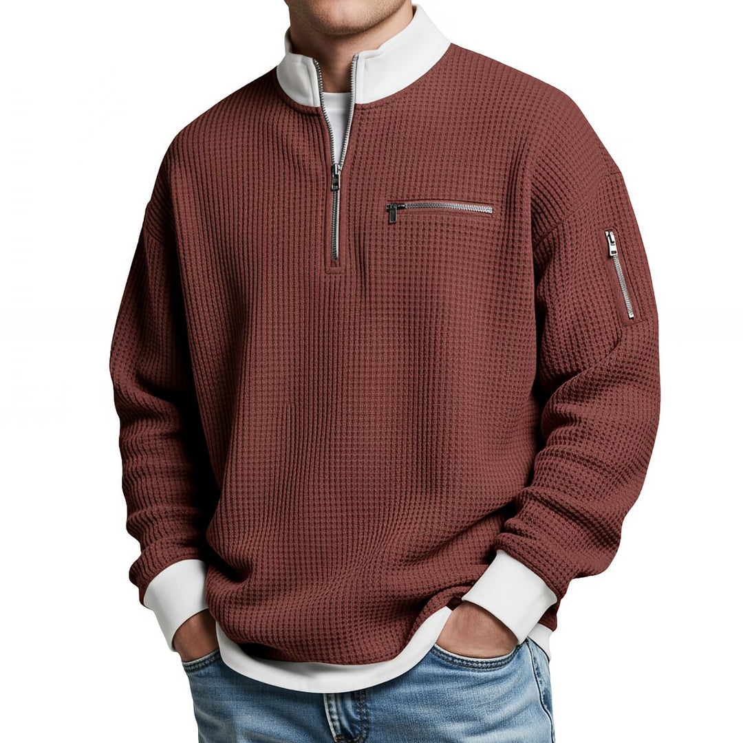 Maglione uomo waffle con mezza zip e tasche con cerniera