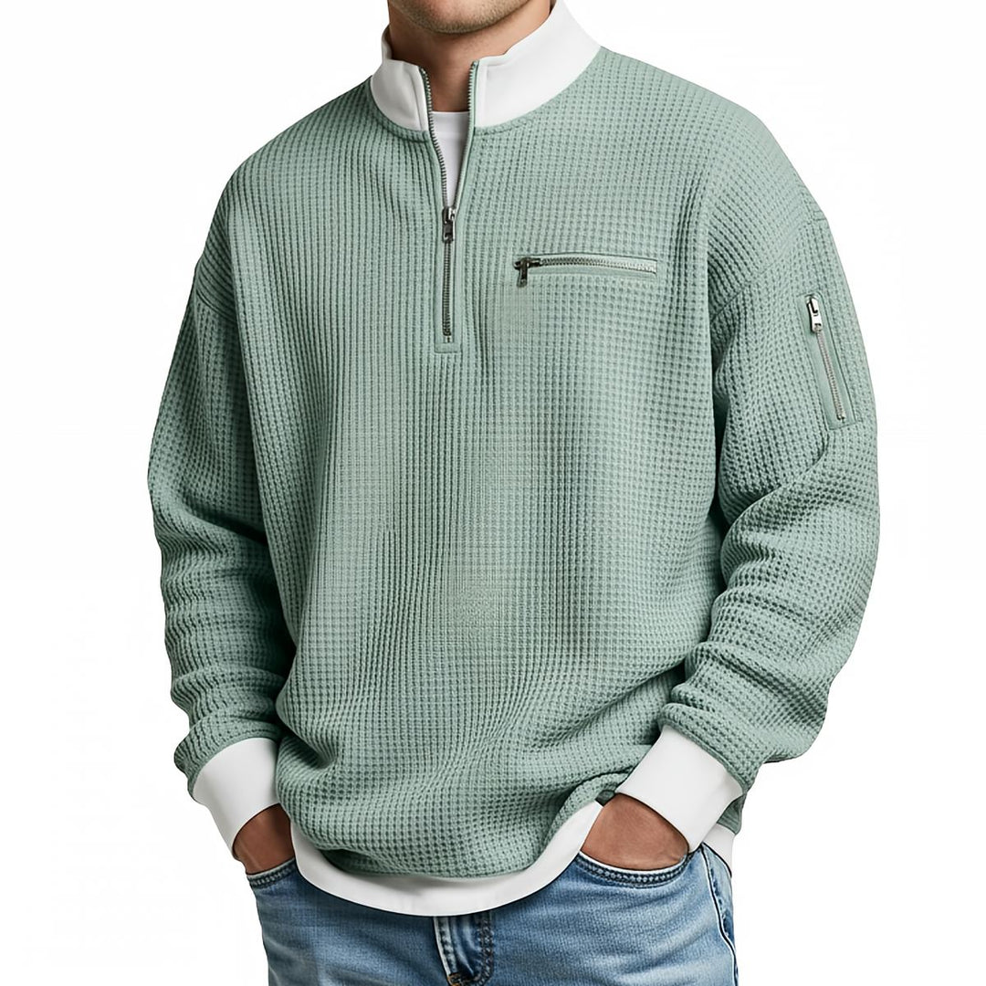 Maglione uomo waffle con mezza zip e tasche con cerniera