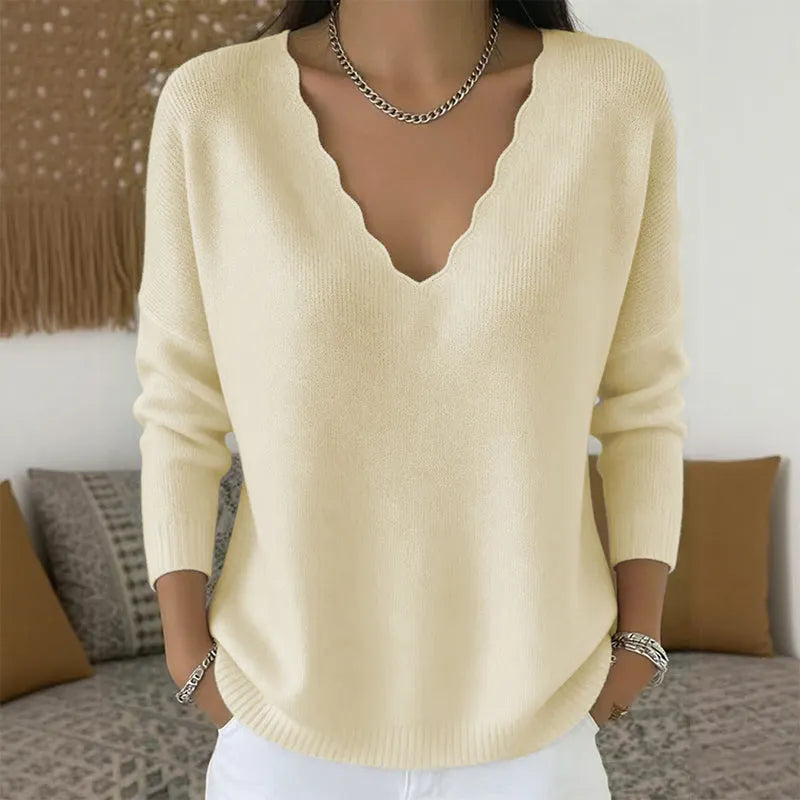Maglione donna con scollo a V e bordo ondulato