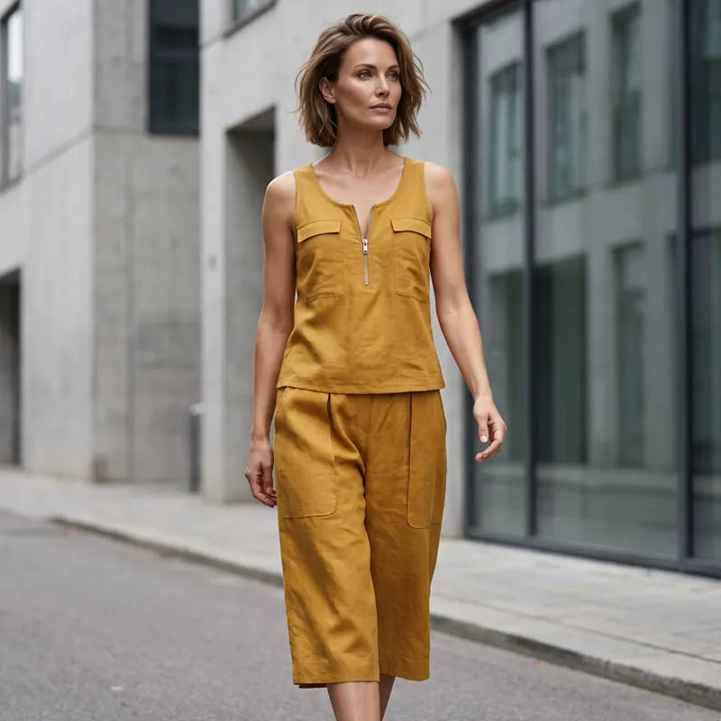 Completo donna senza maniche con zip e pantaloni larghi