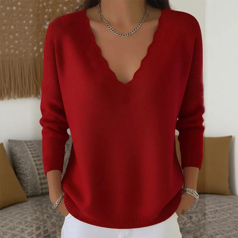 Maglione donna con scollo a V e bordo ondulato