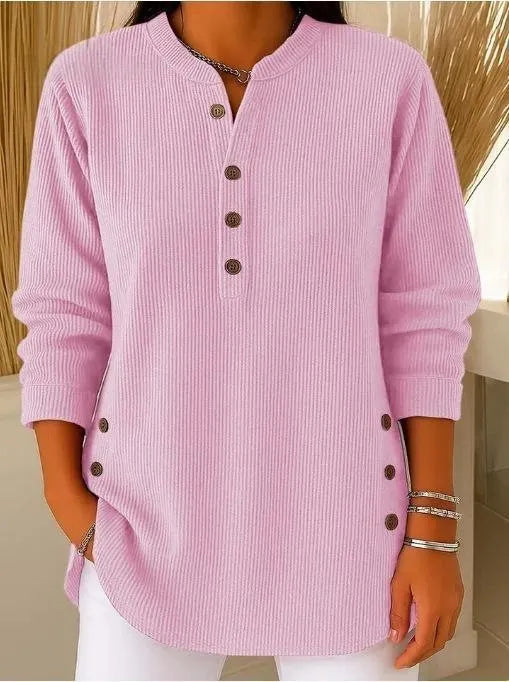 Blusa donna testurizzata con bottoni laterali e maniche lunghe