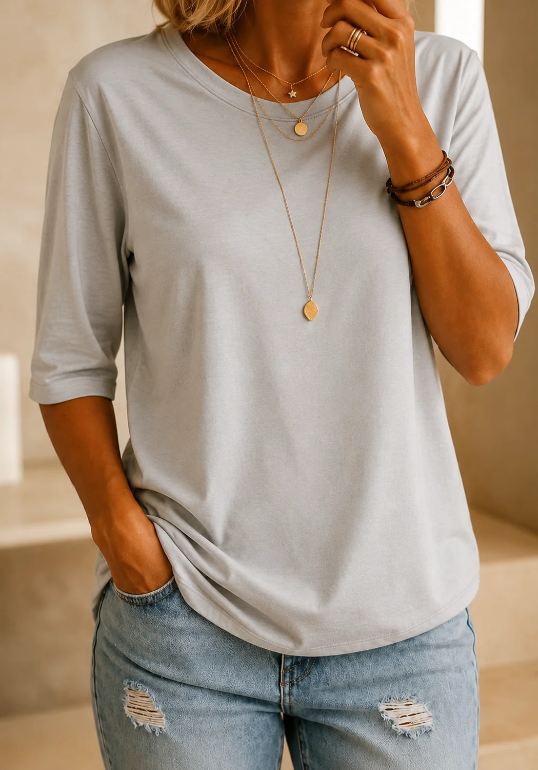 T-shirt da donna in poliestere con maniche a tre quarti