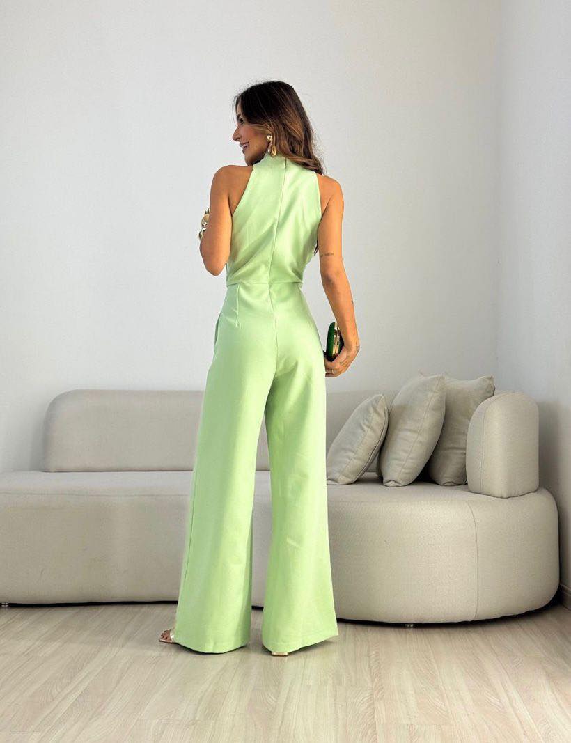 Tuta donna elegante con scollo halter e pantaloni larghi