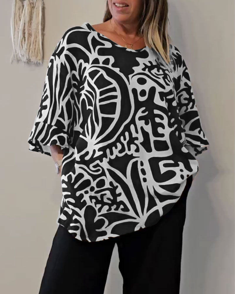 Top donna ampio con stampa astratta