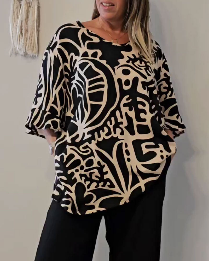 Top donna ampio con stampa astratta