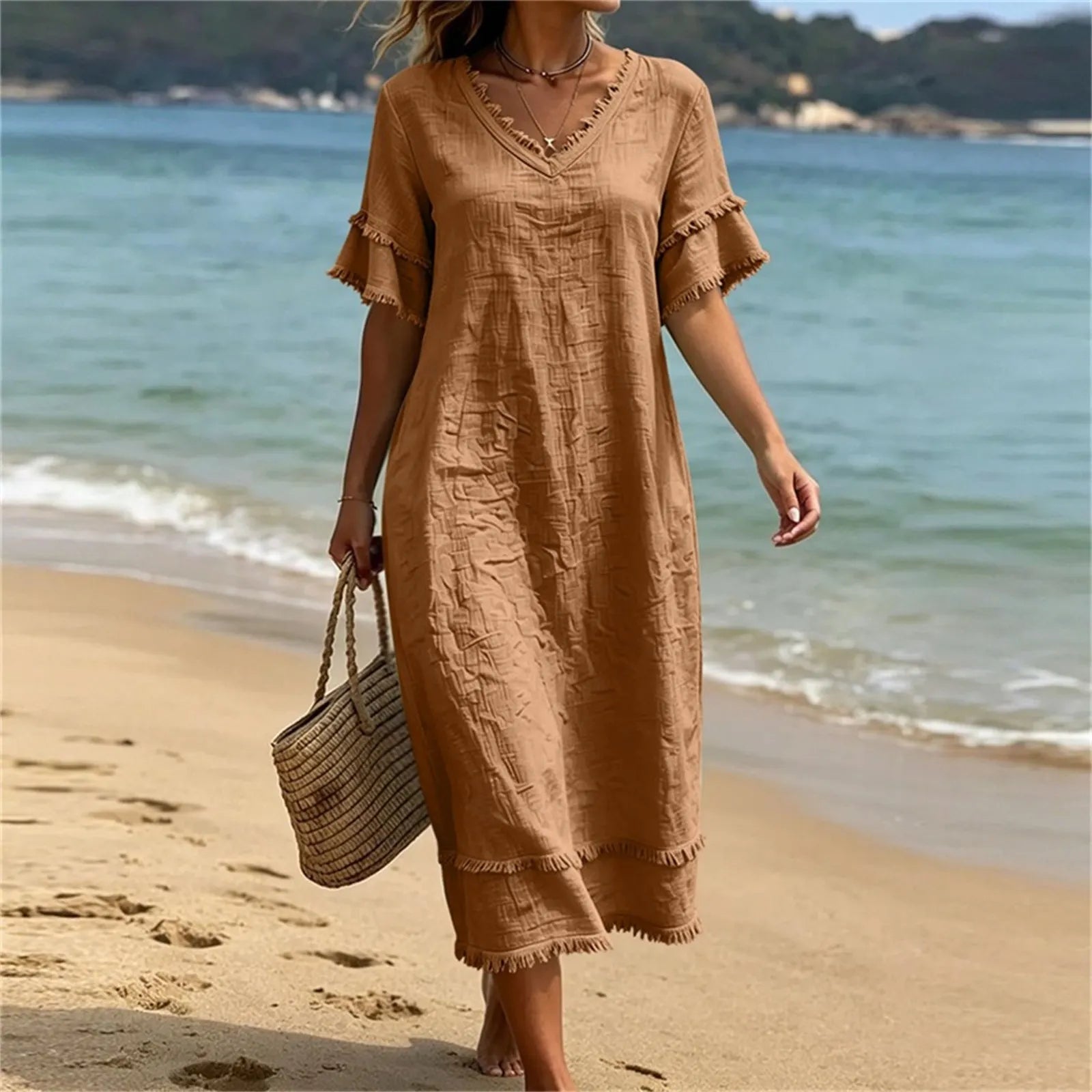 Abito donna bohémien con scollo a V e frange