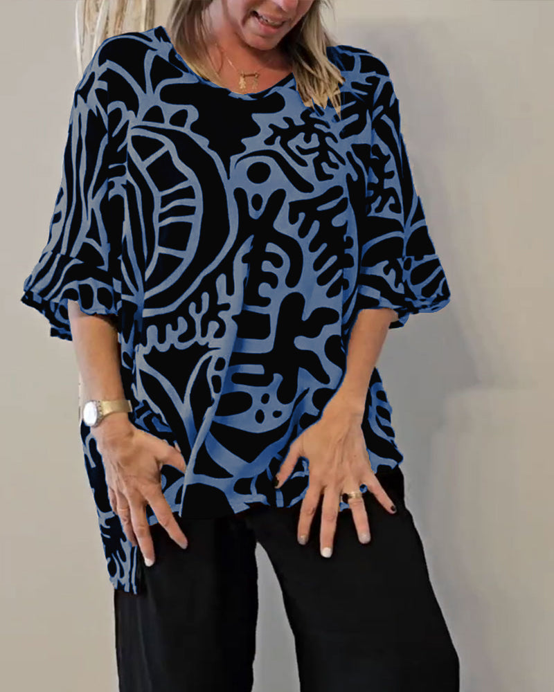 Top donna ampio con stampa astratta