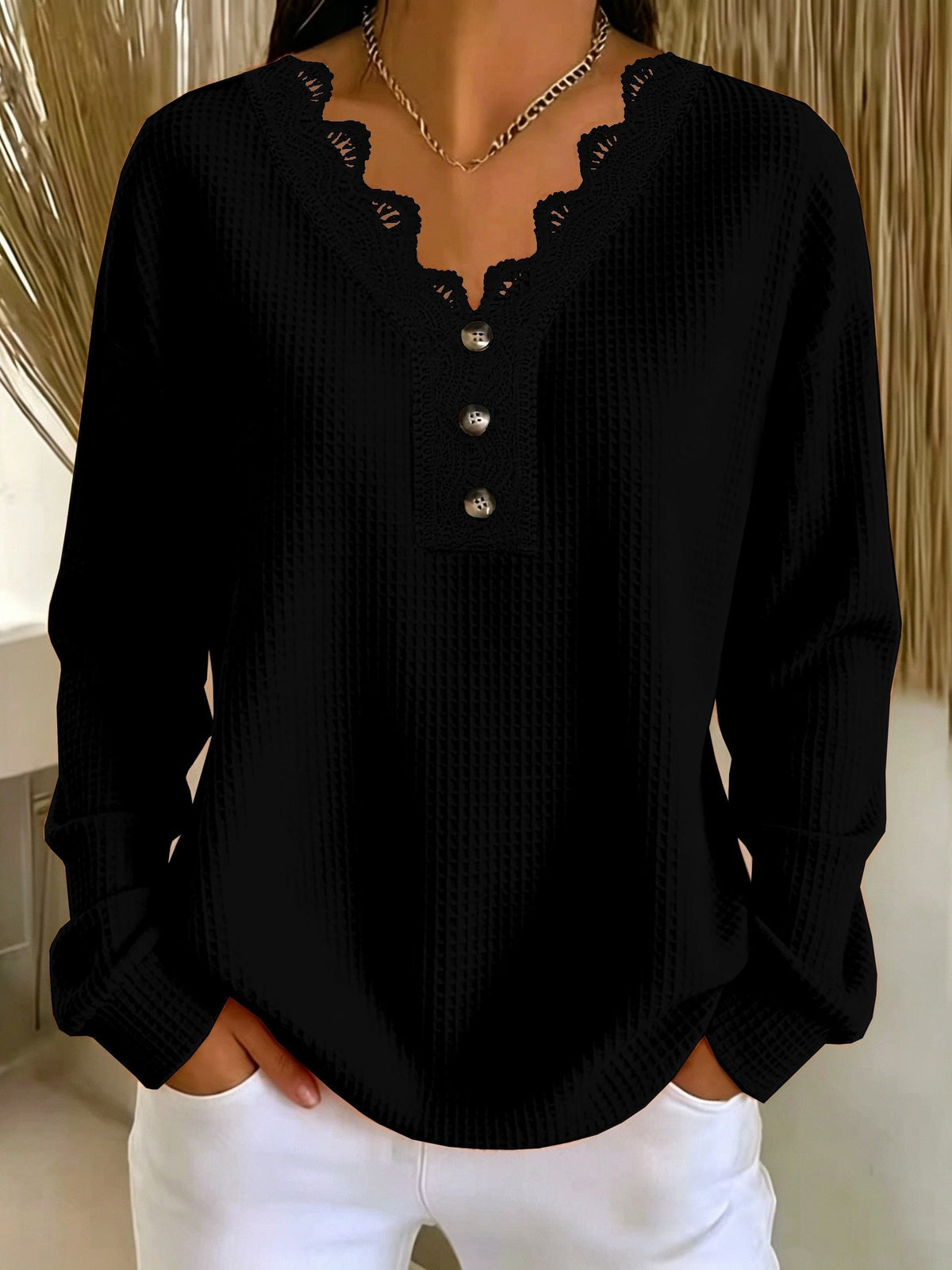 Top donna testurizzato con scollo a V in pizzo