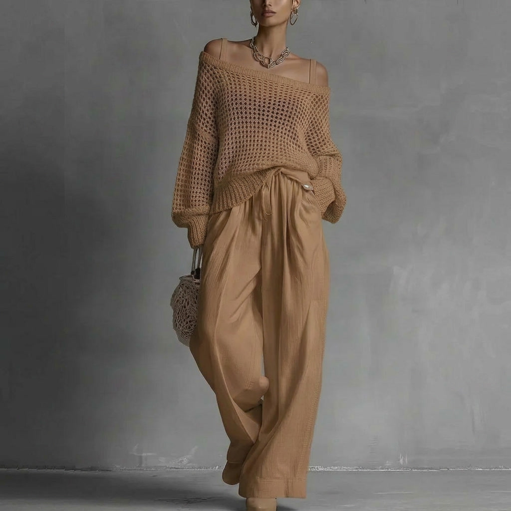 Completo donna maglione traforato pantaloni larghi