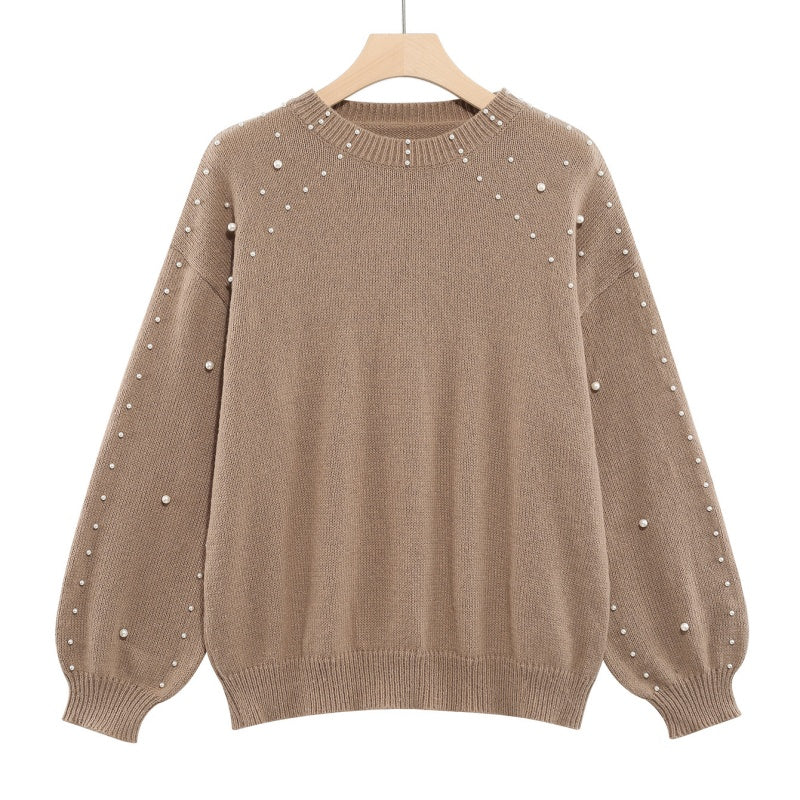 Maglione donna con perle decorative e maniche morbide