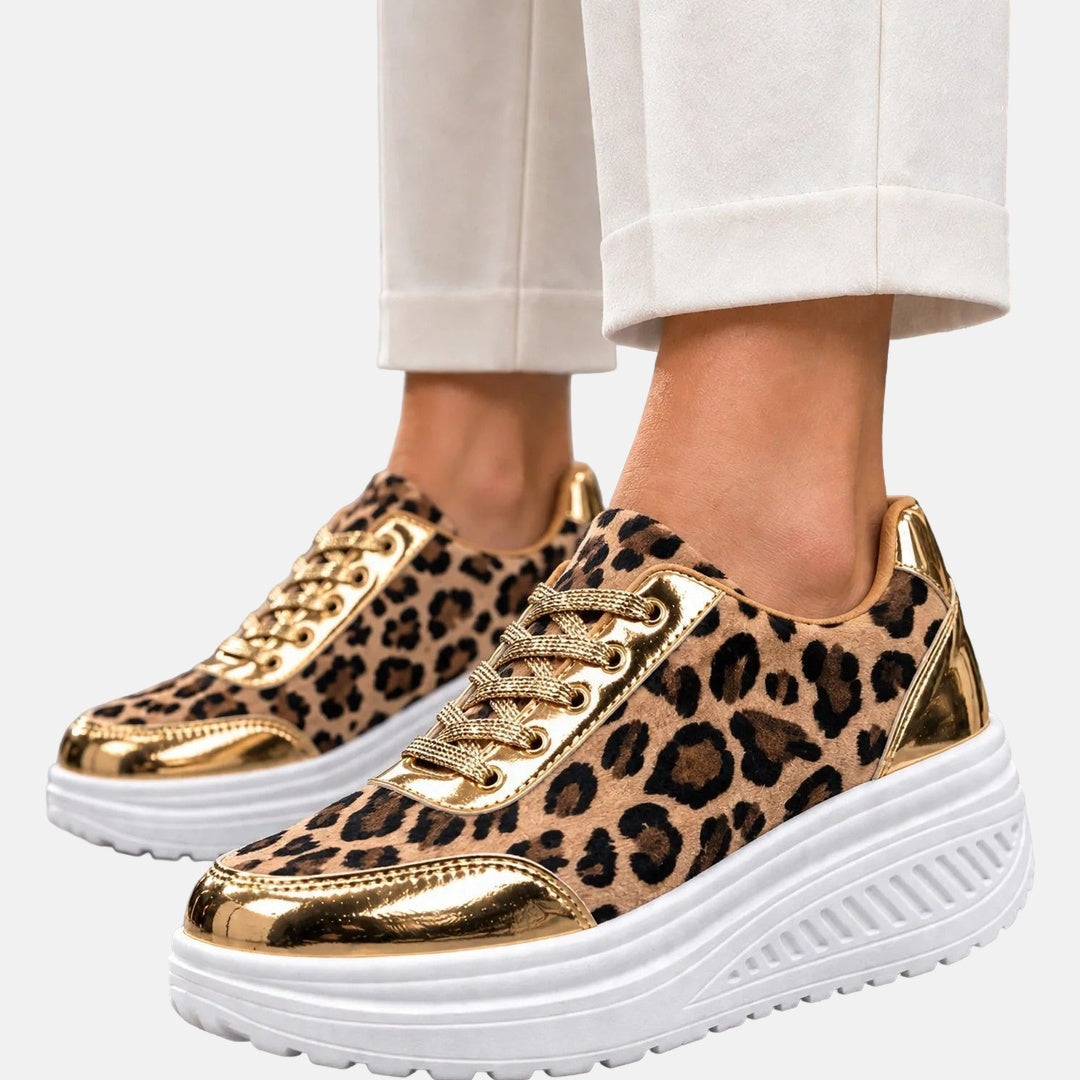 Sneakers donna con zeppa platform e stampa leopardata