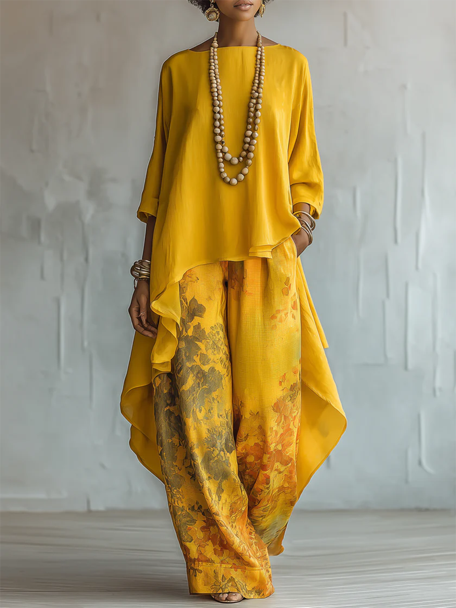 Completo donna boho con blusa asimmetrica e pantaloni floreali