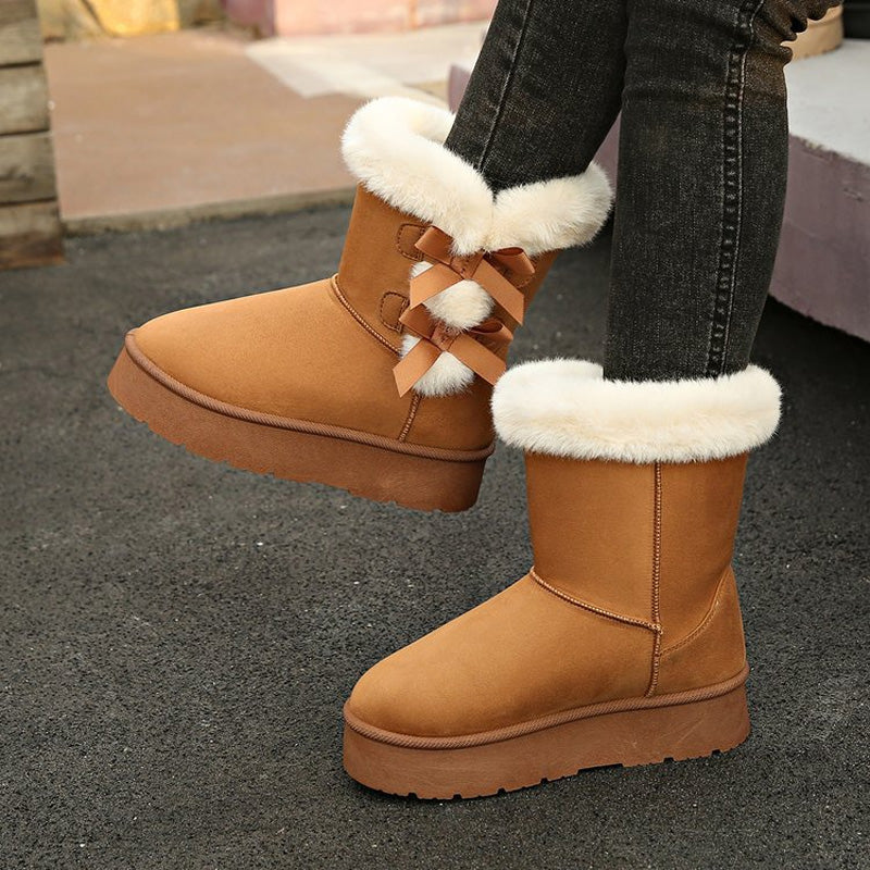 Stivali donna invernali foderati con fiocchi decorativi e suola platform
