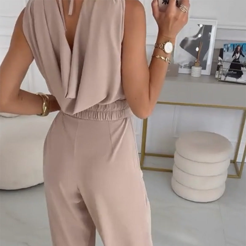 Tuta elegante da donna con fiori 3D e cintura