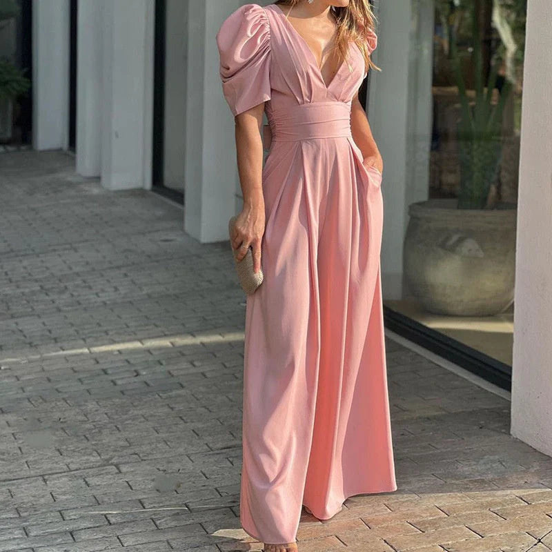 Tuta elegante da donna con scollo a V e palazzo
