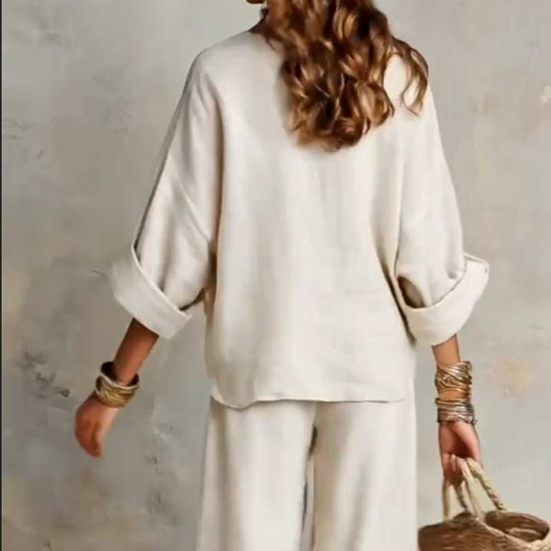 Completo donna resort effetto lino con pantaloni palazzo