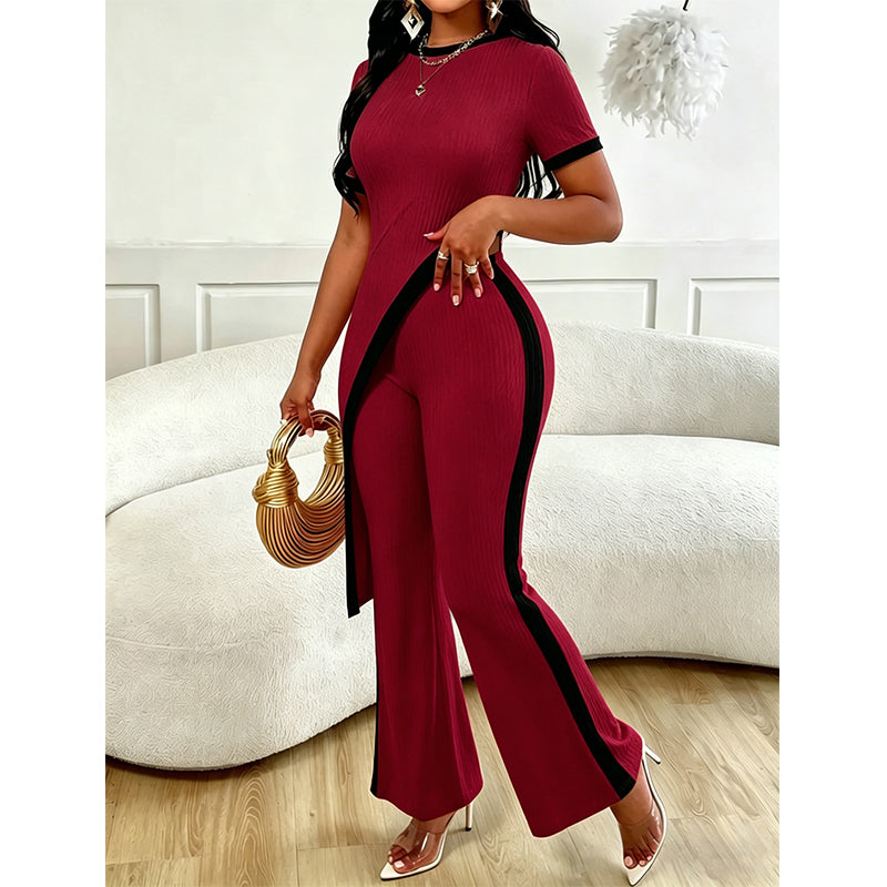 Completo da donna elegante con pantaloni a zampa
