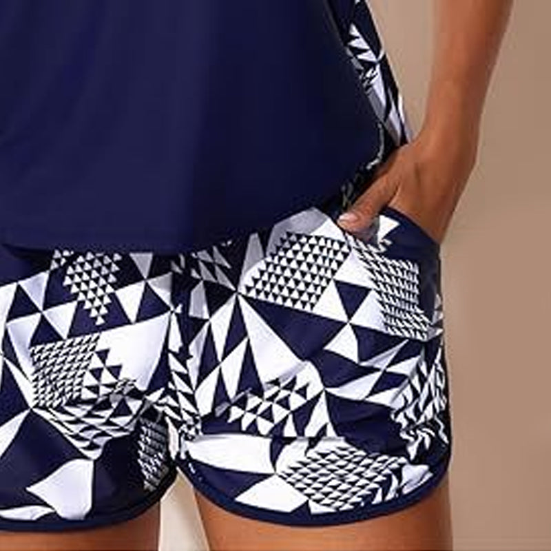 Completo costume donna tropicale con canotta e shorts