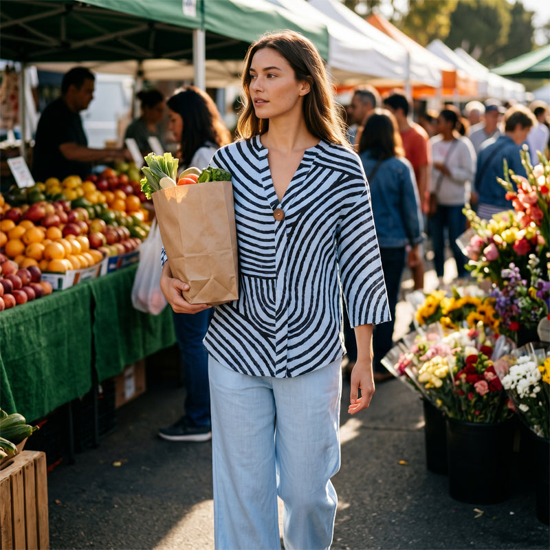 Completo donna a righe con pantaloni larghi