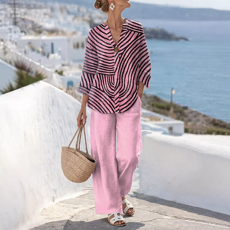 Completo donna a righe con pantaloni larghi