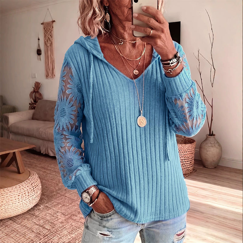 Top donna con cappuccio e maniche in pizzo floreale