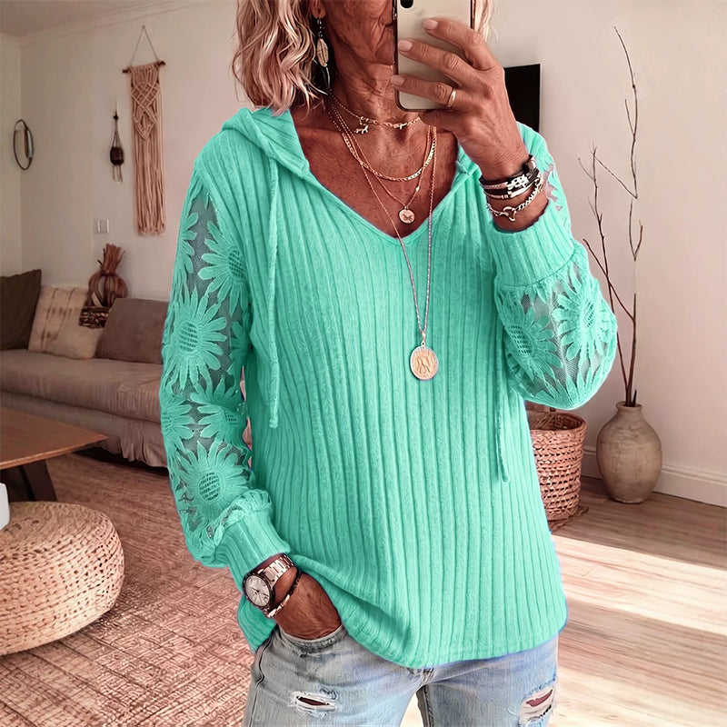 Top donna con cappuccio e maniche in pizzo floreale