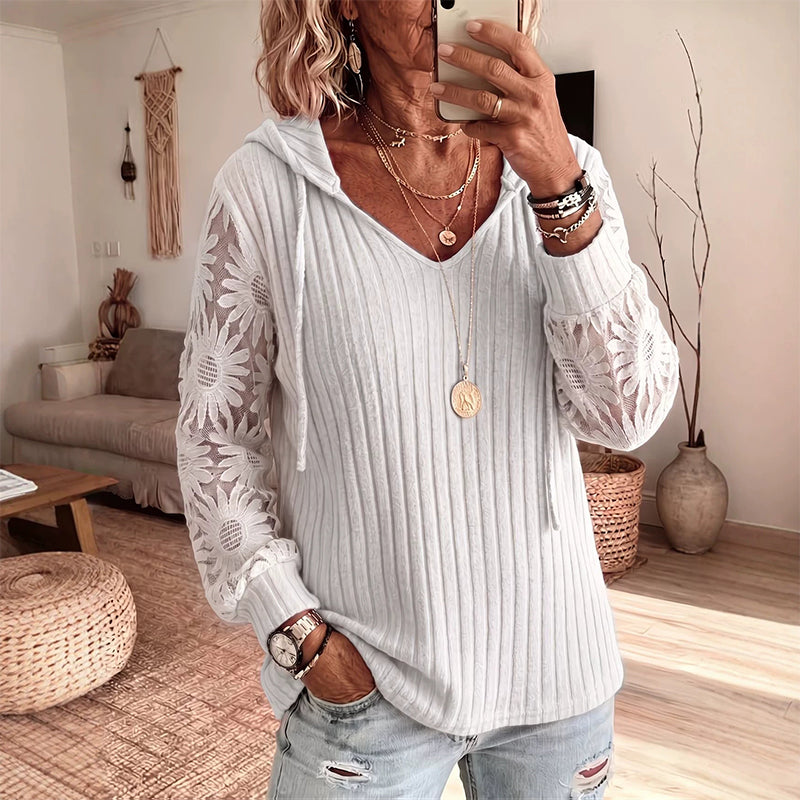 Top donna con cappuccio e maniche in pizzo floreale