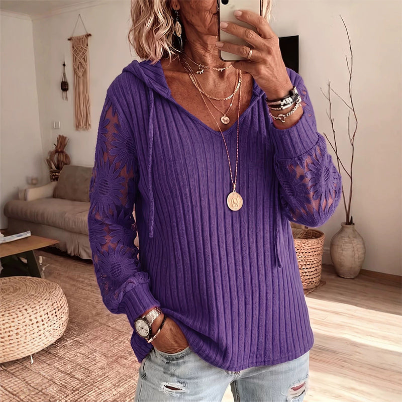Top donna con cappuccio e maniche in pizzo floreale