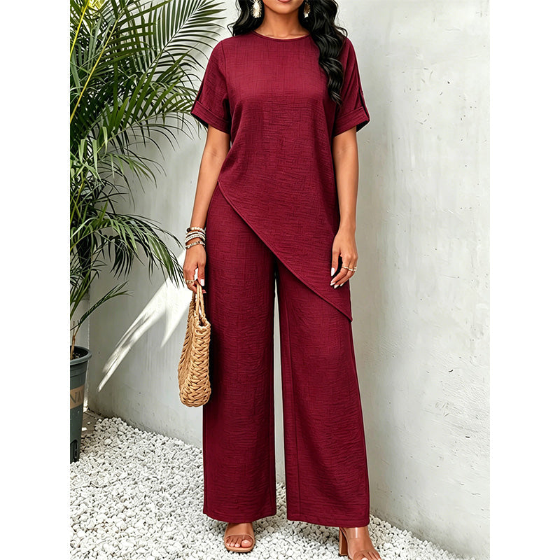 Completo donna due pezzi con top asimmetrico e pantaloni larghi