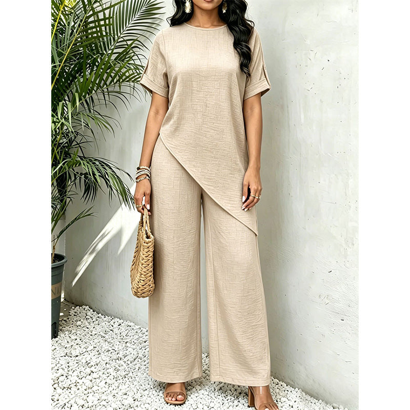 Completo donna due pezzi con top asimmetrico e pantaloni larghi